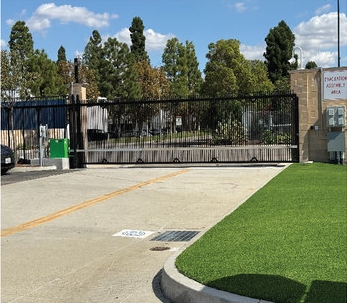 Automated commercial vehicle security gate at a controlled facility entrance