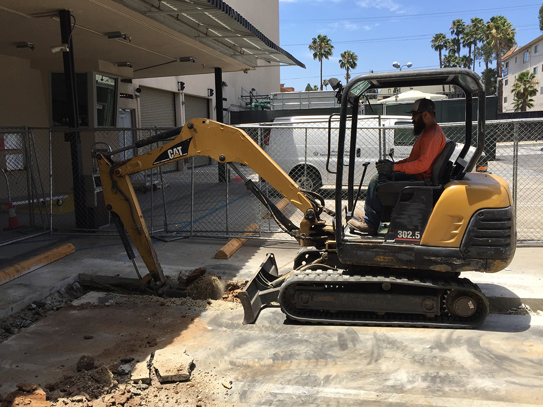 Trenching work at a commercial construction site