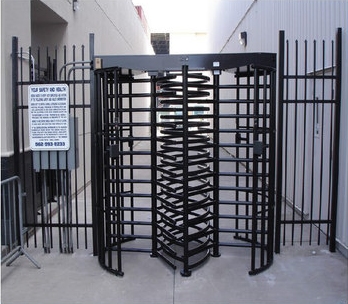 Full-height turnstile installed at a secured pedestrian entrance