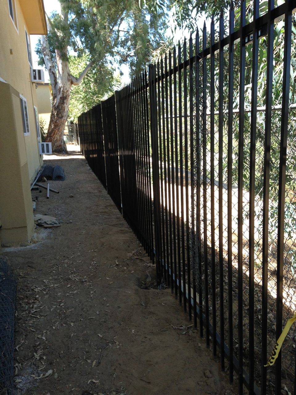 Wrought iron perimeter fencing installation